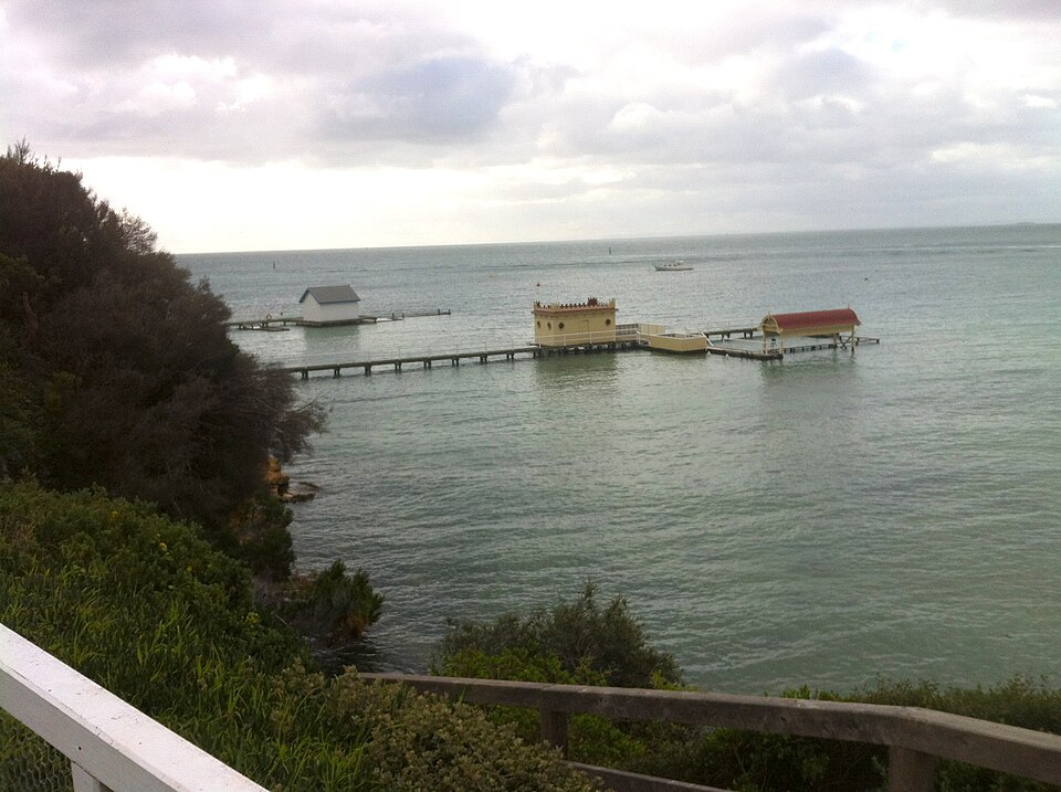 Millionaires Walk — jetties and bay